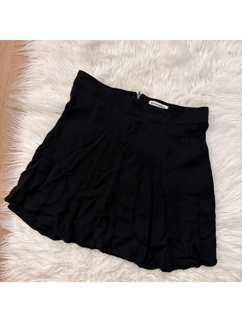 Reformation black mini skirt size 10
